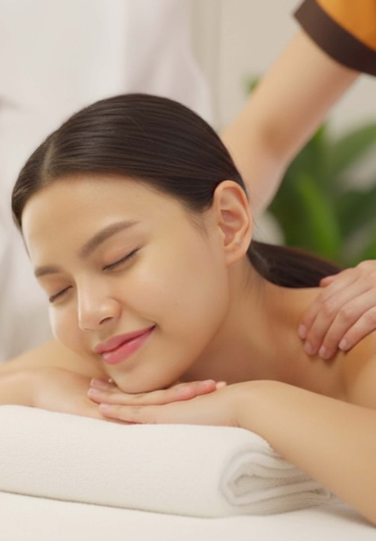 Woman receiving a massage with a blurred background