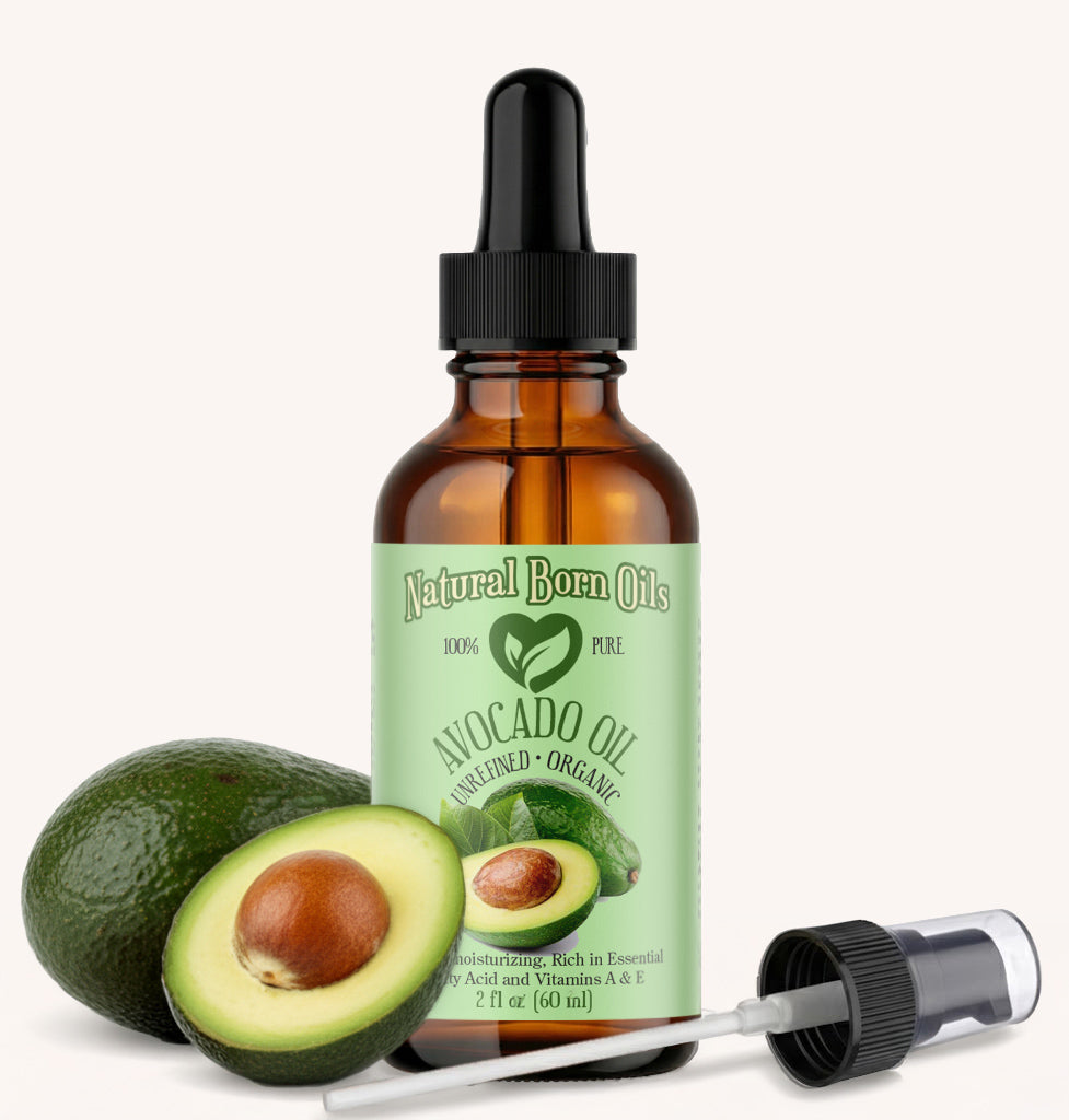 Bottle of avocado oil with a dropper and an avocado next to it on a white background