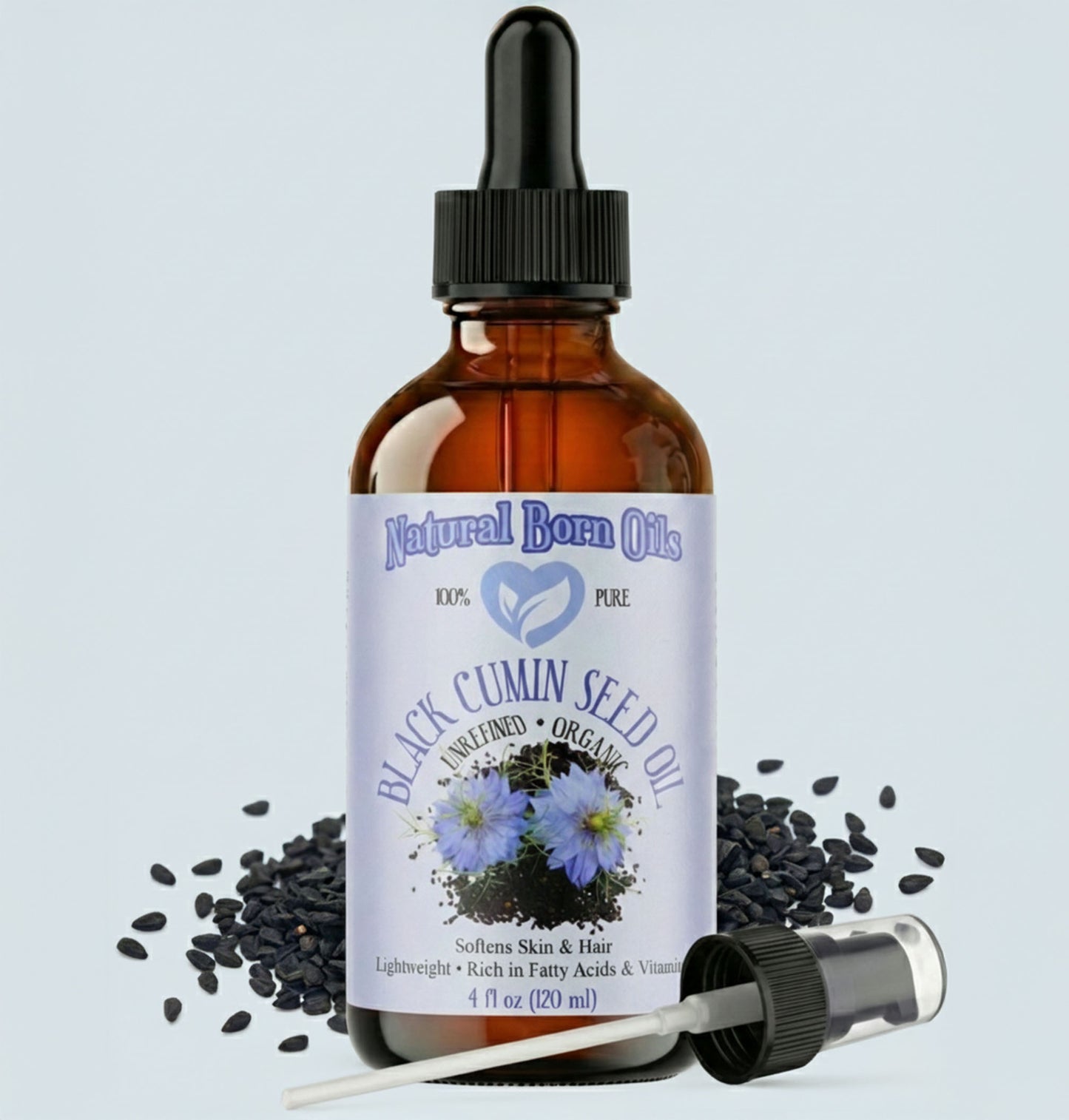 Bottle of Natural Born Oils Black Cumin Seed Oil with dropper on a light gray background