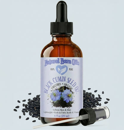 Bottle of Natural Born Oils Black Cumin Seed Oil with dropper on a light gray background