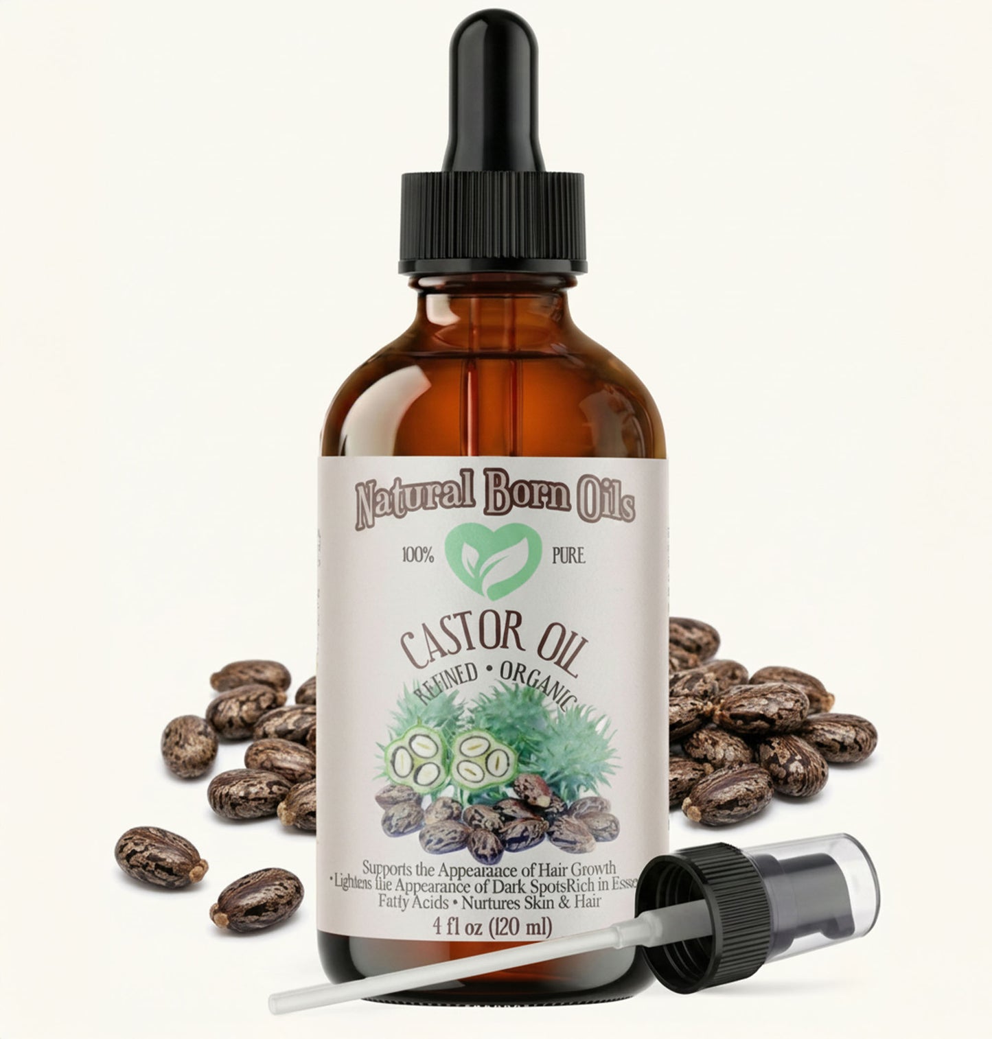 Bottle of Natural Born Oils castor oil with dropper and beans on a white background