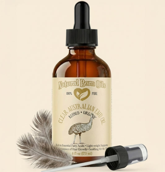 Bottle of Natural Barn Oils with dropper on a beige background