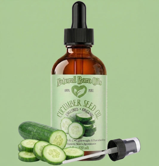 Bottle of Natural Born Oils Cucumber Seed Oil with a dropper on a green background
