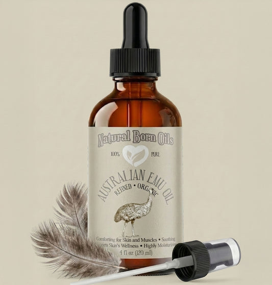 Bottle of Australian Emu Oil with dropper and feather on a beige background