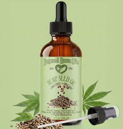 Bottle of Natural Born Oils hemp seed oil with a dropper on a green background