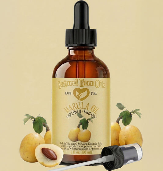 Bottle of Natural Born Oils marula oil with dropper on a beige background