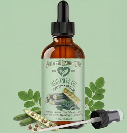 Bottle of Natural Born Oils Moringa oil with dropper on a green background