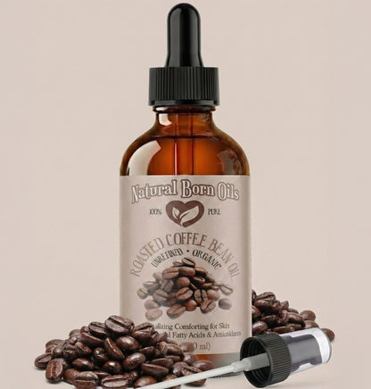 Bottle of Natural Born Oils roasted coffee bean oil with coffee beans on a beige background