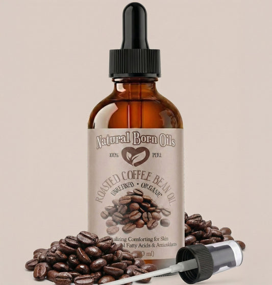 Bottle of Natural Born Oils roasted coffee bean oil with coffee beans on a beige background