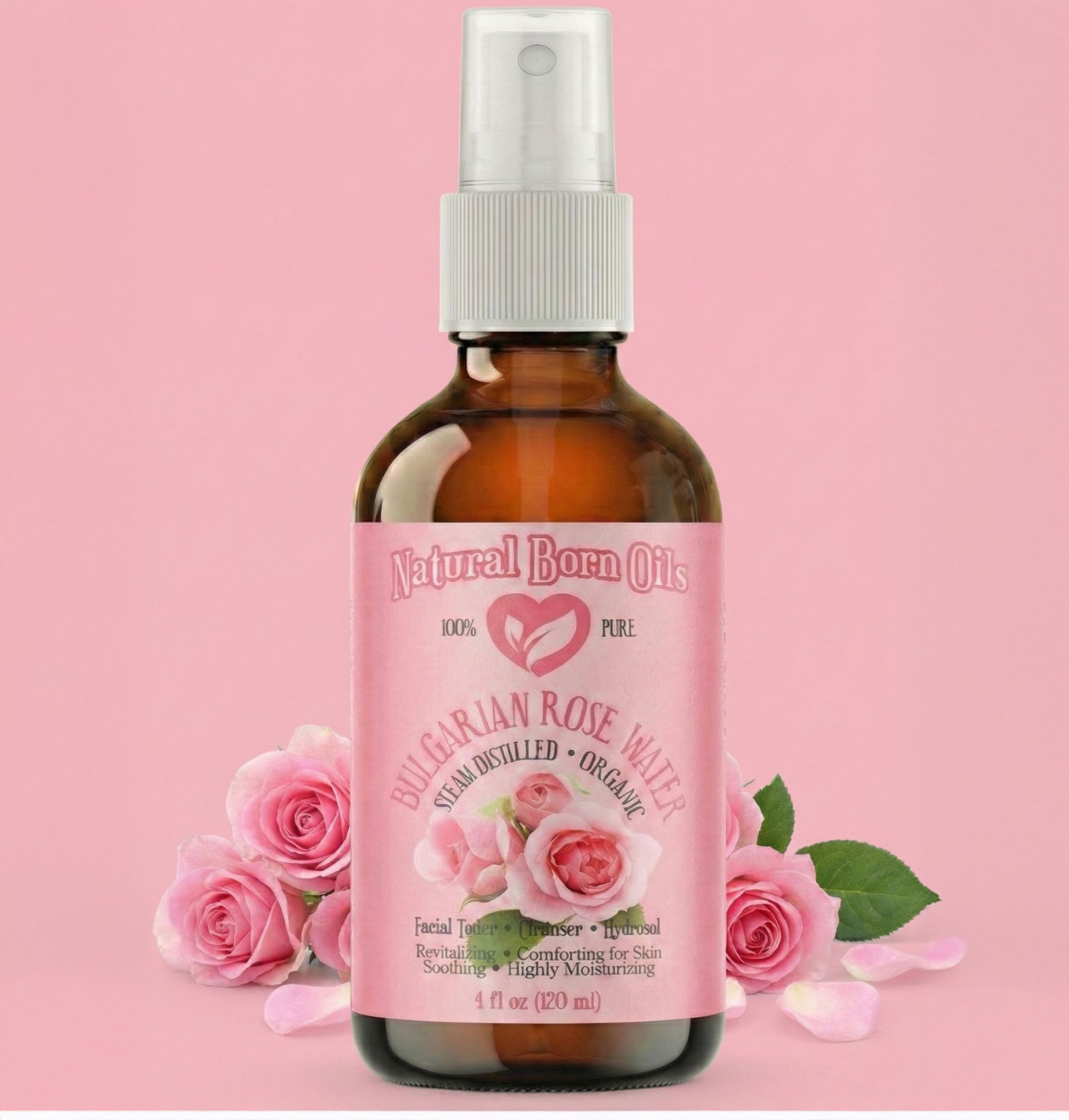 Bottle of Bulgarian Rose Water with pink roses on a pink background