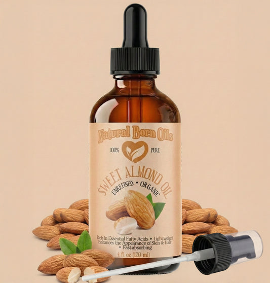 Bottle of Natural Born Oils sweet almond oil with almonds on a beige background