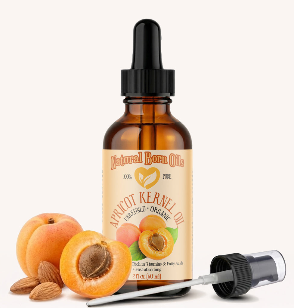 Bottle of apricot kernel oil with a dropper on a white background
